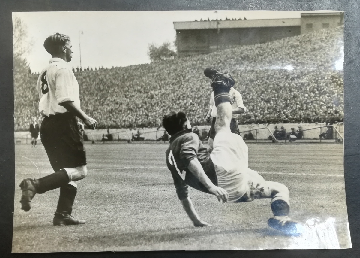 Swiss player Rudolf Gyger clears the ball front in front of Raich Carter, as they go on the beat England 1 - 0 in a friendly in 1947 in Zurich.