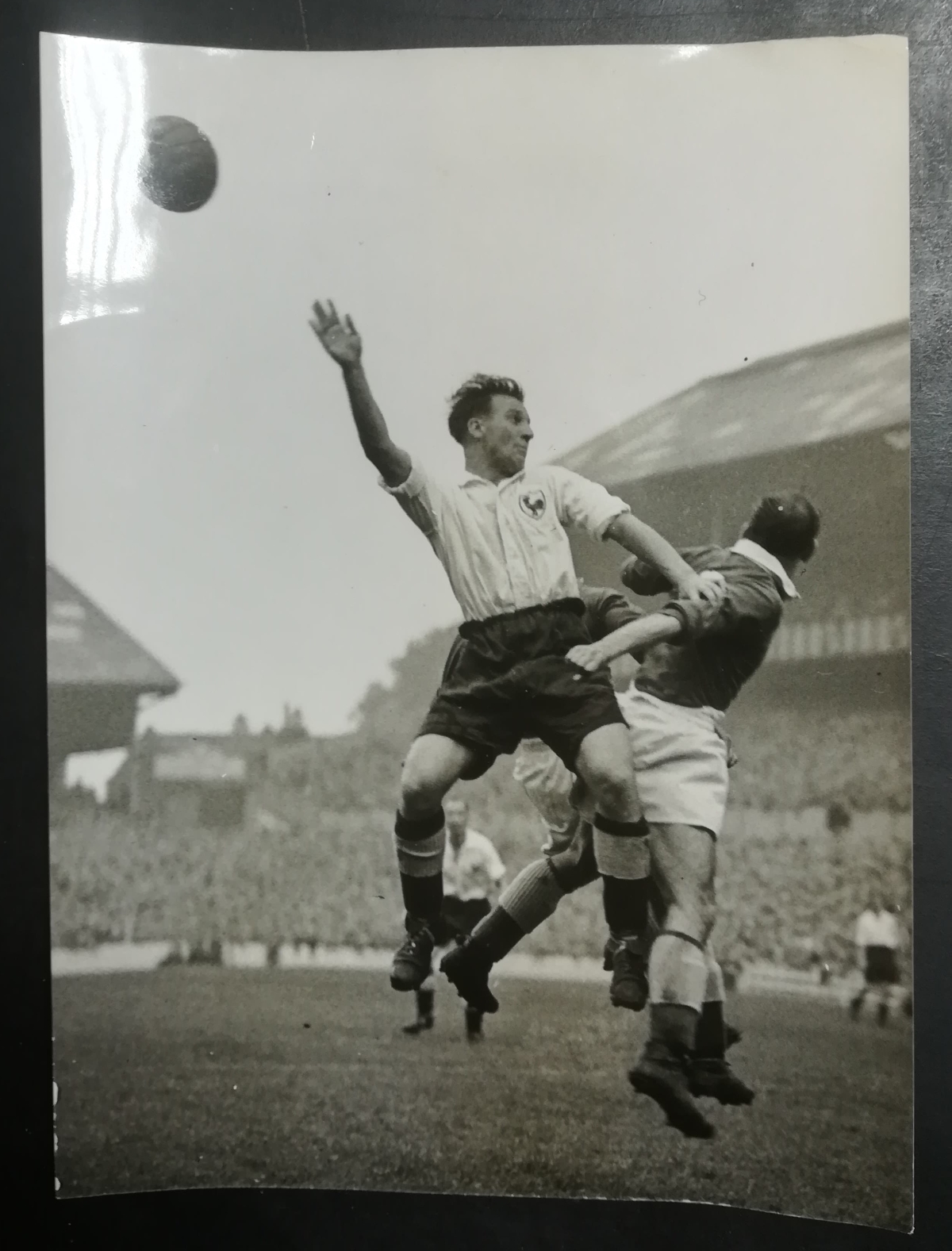 Bell of Chesterfield FC clears the ball away from Eddie Baily of Spurs, Christmas Day 1947.